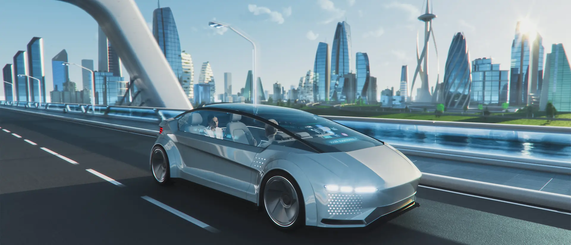 Computer-generated image of a futuristic metallic gray car with a glass top. It´s being driven on a road with futuristic glass skyscrapers in the background.