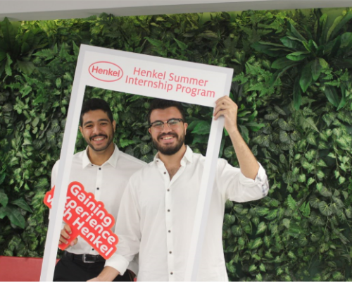 Two Henkel employees having fun at an event