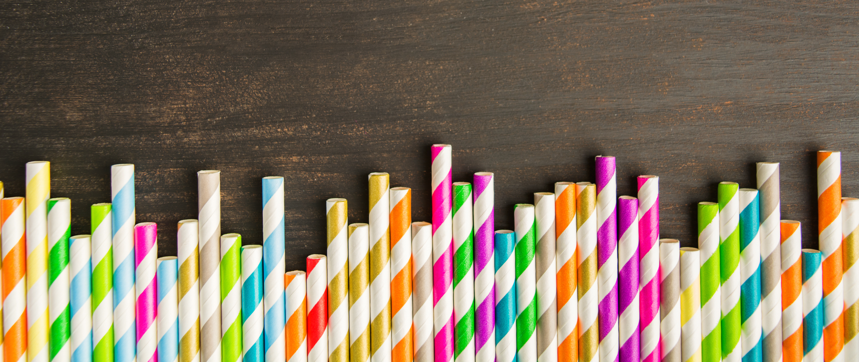 A row of assorted striped drinking straws