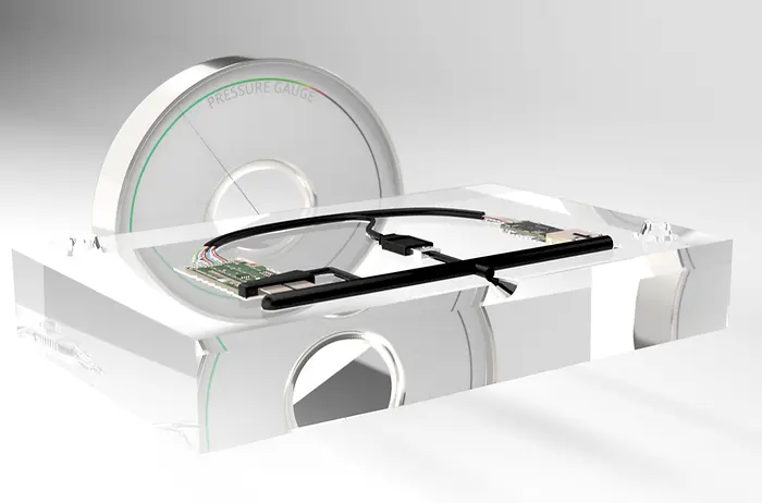 Low pressure molding process: The bare electronics are inserted into a predesigned mold set. TECHNOMELT® encapsulates electronics at low pressure. After molding, parts get tested and moved to final assembly. 