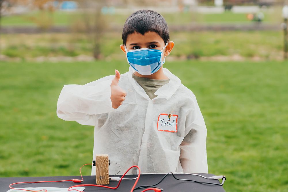 child conducting experiments at Henkel Researchers’ World