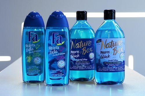 Blue bottles of the brands Fa and Nature Box