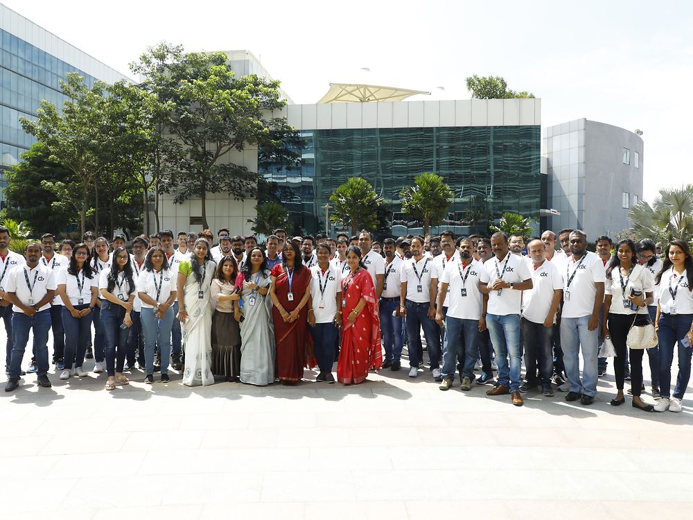 The GTC team standing in front of the new Global Technology Center in Bengaluru, India.