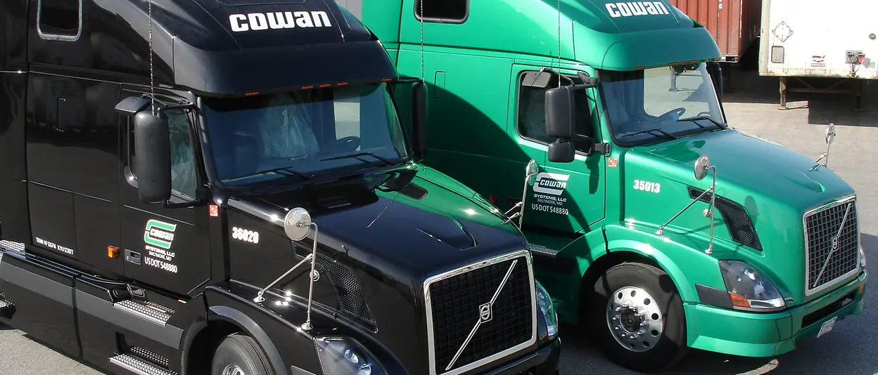 photos of various trucks and drivers smiling inside truck cab