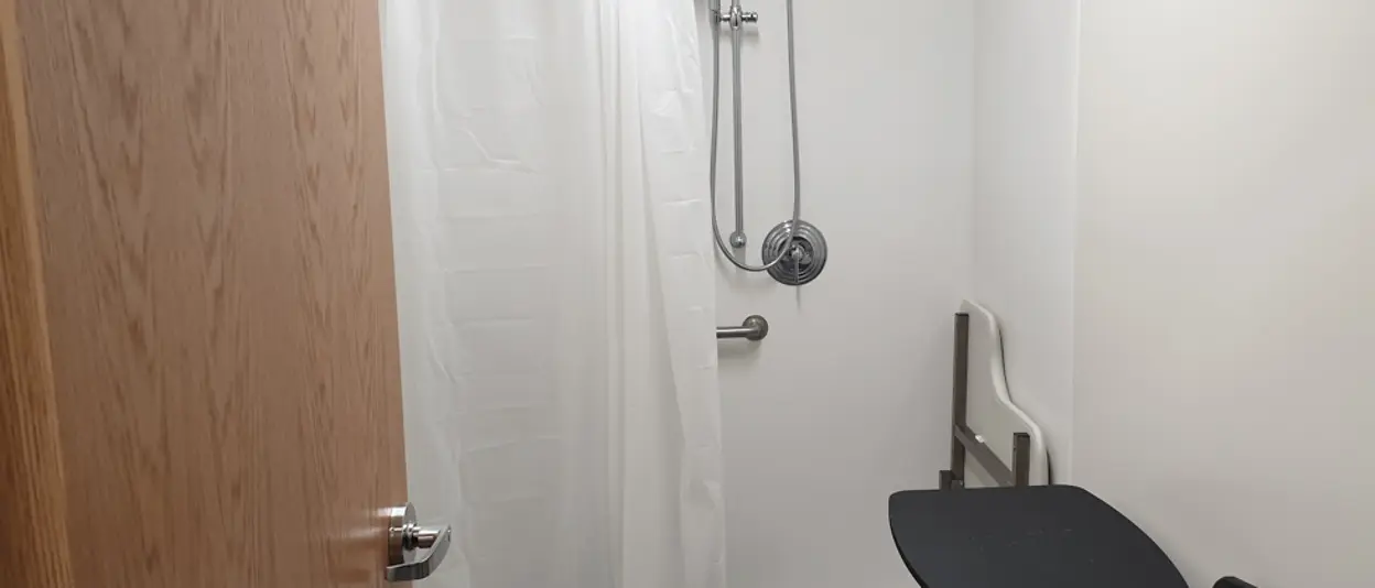 photos of distribution point amenities for truck drivers, including kitchens and showers