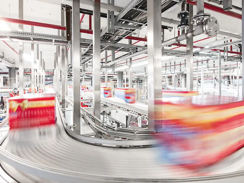 Henkel products on a factory assembly line.