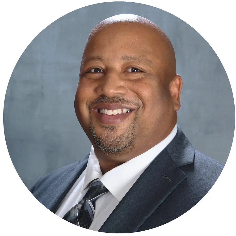 man smiling into camera 