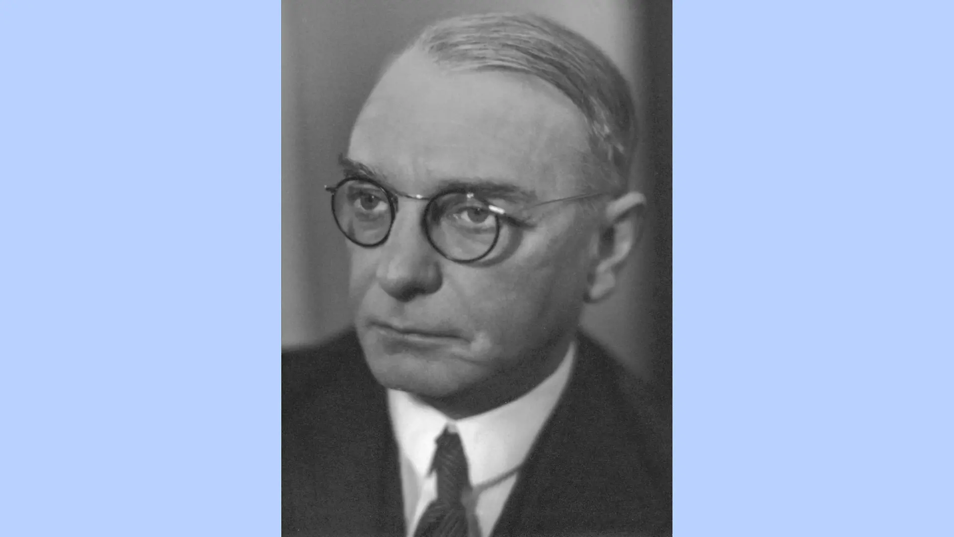 Black and white photo portrait of Dr. Hugo Henkel.