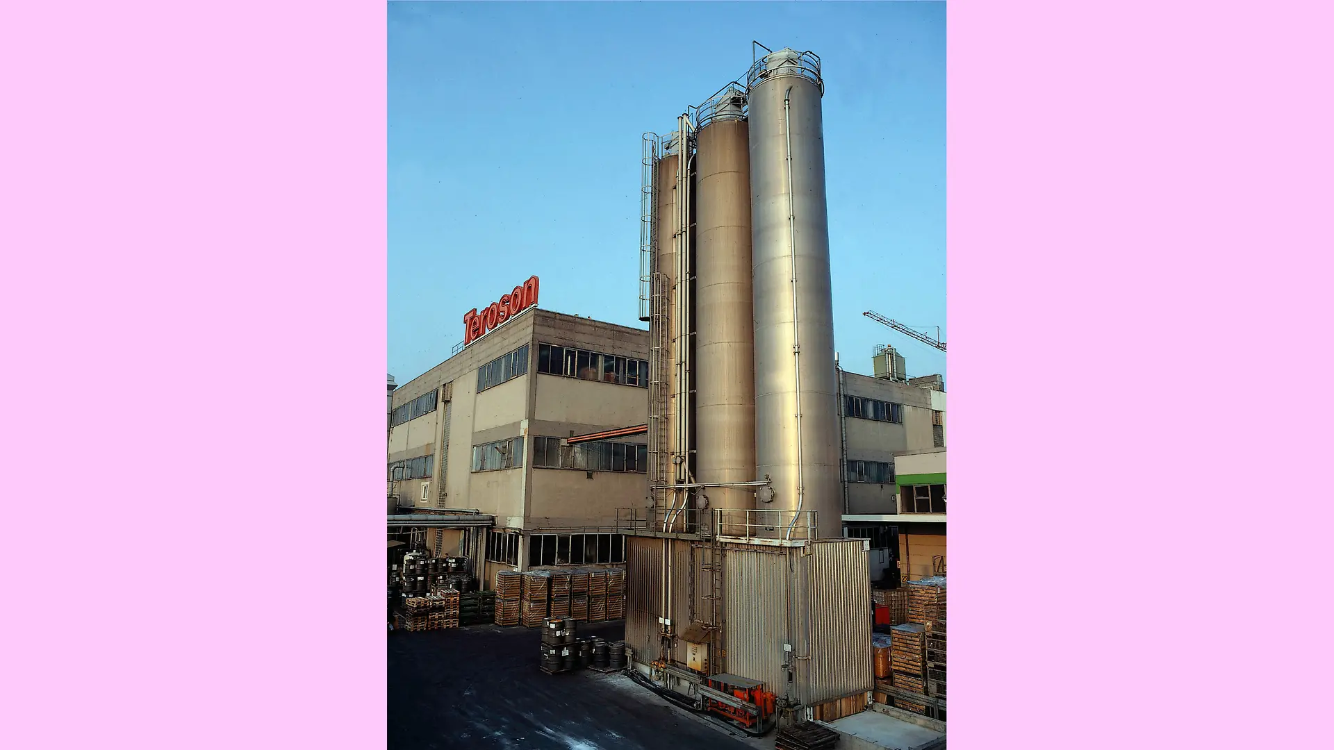 A view of the Teroson plant in Heidelberg. In the background, a Teroson logo is emblazoned on an industrial building.