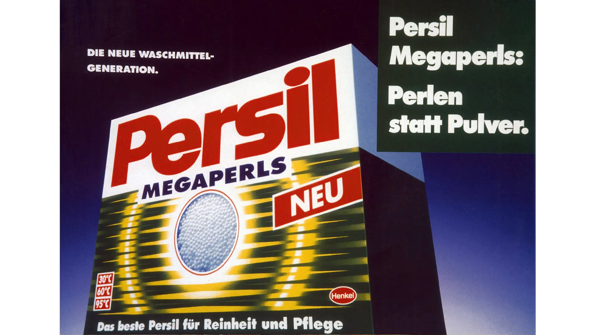 An advertisement for Persil Megaperls. The angular, white and green cardboard packaging of the product is slanted slightly in the centre of the picture. In the top left corner, the text reads: “The new generation of detergents”. On the right-hand edge of the picture, in large letters, it says: “Persil Megaperls: Pearls instead of powder”.