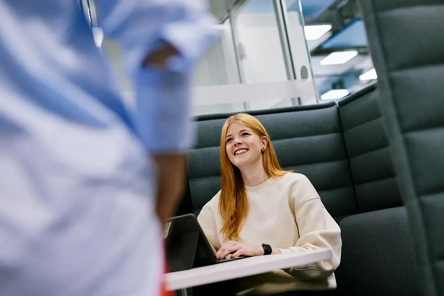 Collage of two images and a text field: the first picture shows a woman in a learning environment, the second shows a few folders.