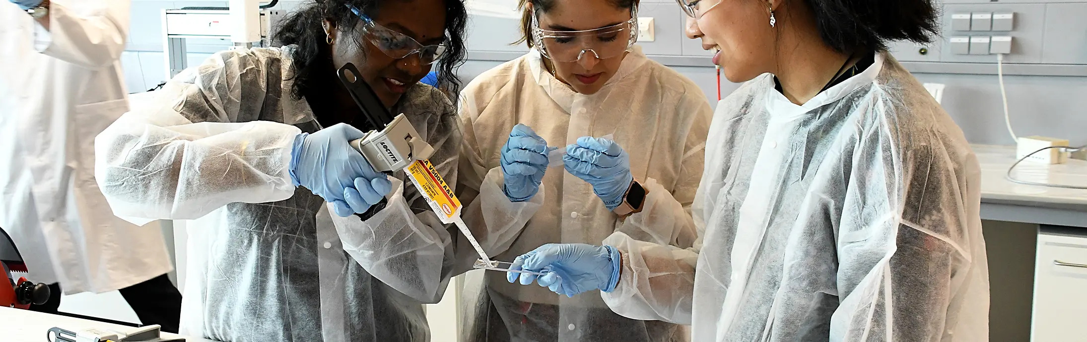 Collage of two images and a text field: the first picture shows three women working in a laboratory, the second shows a liquid.