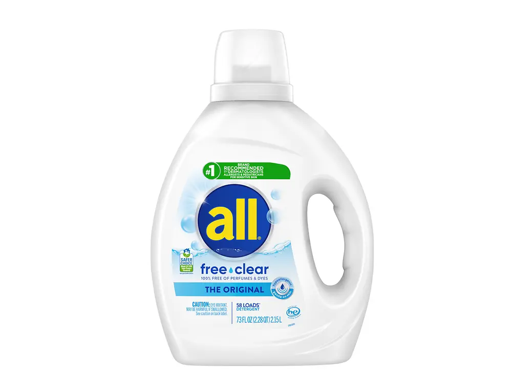 
Bottle of All Free Clear liquid laundry detergent with a built in handle and measuring cap 