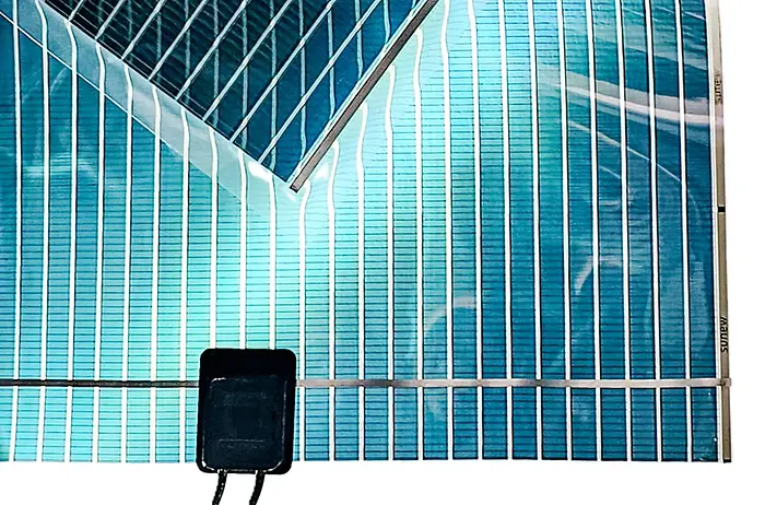 
Brilliant Matters produces advanced, eco-friendly organic semiconductor materials used to manufacture lightweight, flexible, and semi-transparent Organic Photovoltaic (OPV) panels. Unlike conventional silicon-based photovoltaic technology, OPV panels are produced using advanced material inks that can be printed through roll-to-roll manufacturing processes, similar to newspaper printing. (Image: Brilliant Matters)
