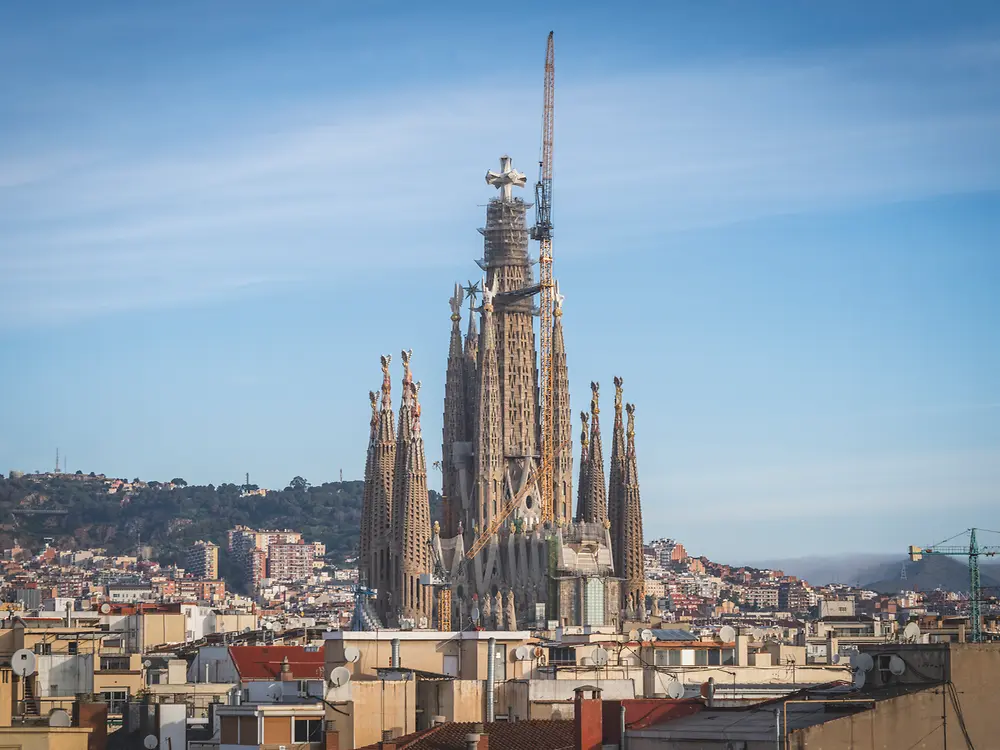 View of the Tower of Jesus Christ nearing completion with the cross already installed