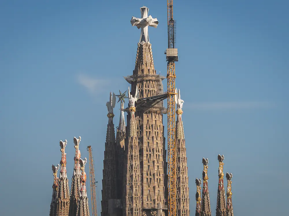 Close-up of the cross crowning the Tower of Jesus Christ during final construction works