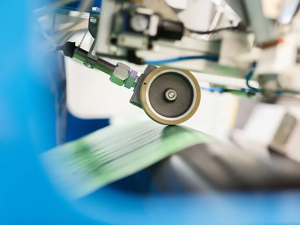
Filmer line roller for controlled film processing