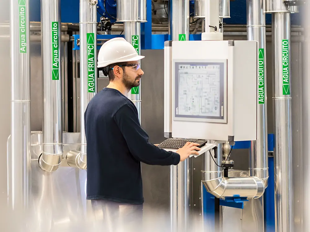 
Operator monitoring mixer system for adhesive production