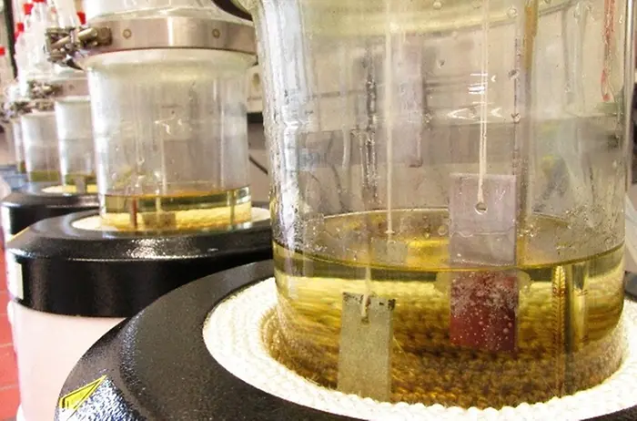 Vats used to conduct corrosivity tests.