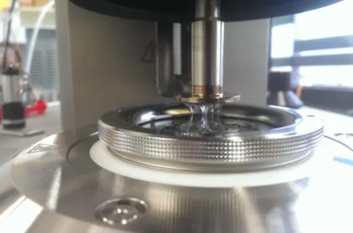 Photo of a machine used to conduct rheological analyses.