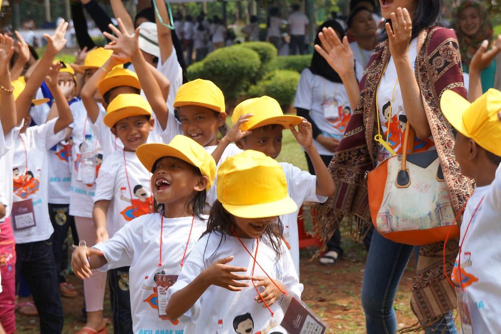 Children enjoying themselves at the Sahabat Anak carnival event.