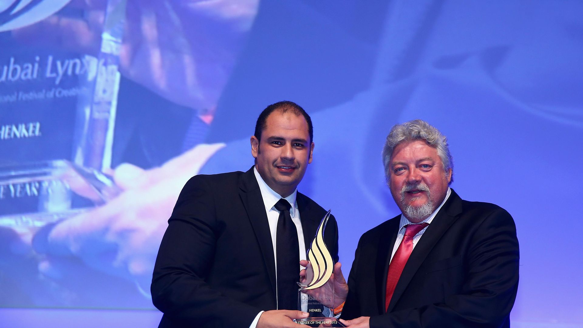 Mohamed Siam, Henkel’s Regional Marketing Director in MENA (left) accepts the Advertiser of the Year Award