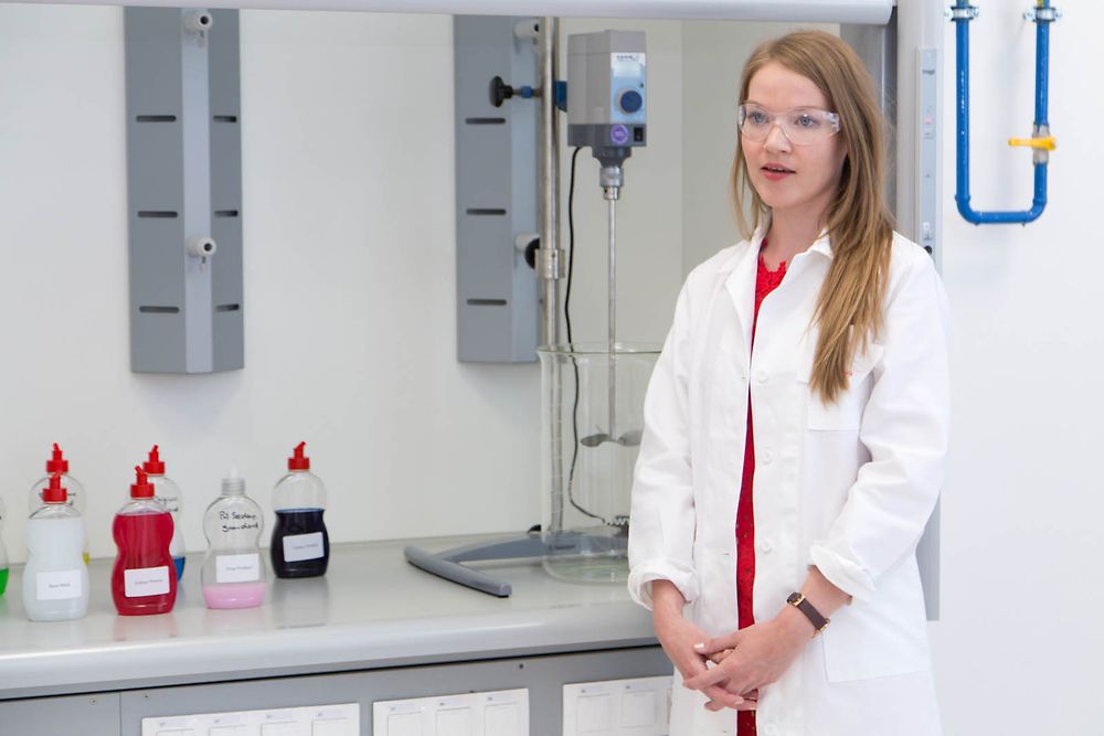 Eva Ondrišová, Bratislava Laboratory Team Lead demonstrates the process of mixing surfactant