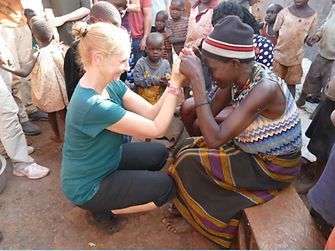 Gabriele Haak from Germany with the mother of one of the girls who lives in the Mirembe Cottage of Street Girls in Jinja, Uganda