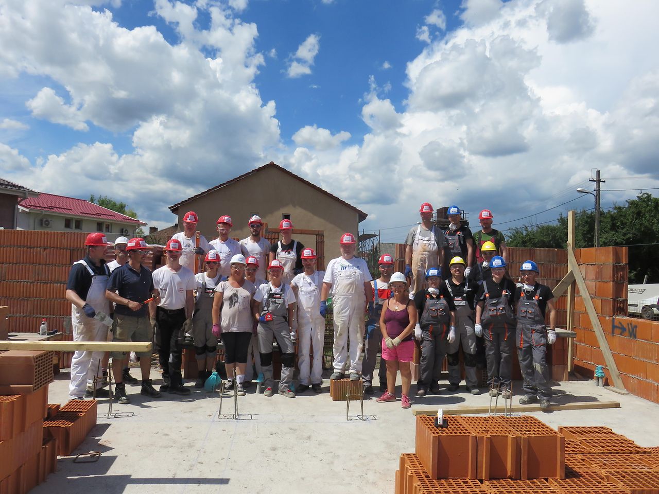 volunteers at a construction site in Romania