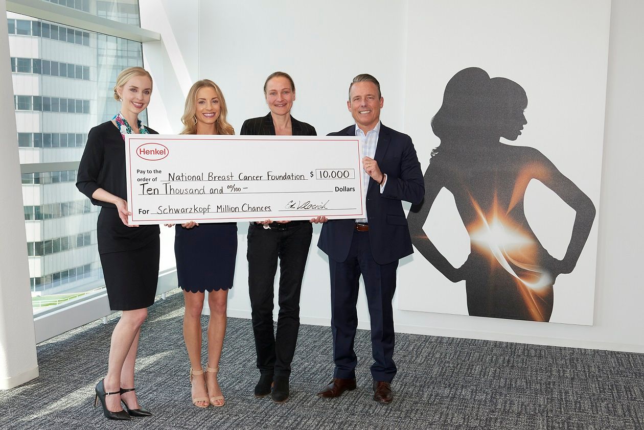 Danae Johnson, Senior Director of Development, and Kara Causey, Corporate Partner Manager for National Breast Cancer Foundation, accept a donation from Xenia Barth, Henkel's North America Vice President of Marketing, Hair; and Ed Vlacich, North America Region Head, Henkel Beauty Care, to kick off the partnership between the organizations as part of the company's Schwarzkopf Million Chances initiative.
