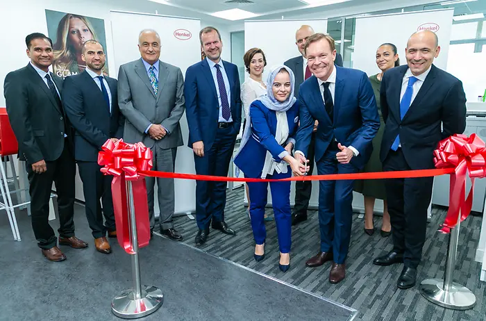 Jens-Martin Schwärzler, Executive Vice President Beauty Care (third from right) and Olfa Aouida, Head of R&D MEA, Beauty Care (sixth from left) during the ribbon cutting.