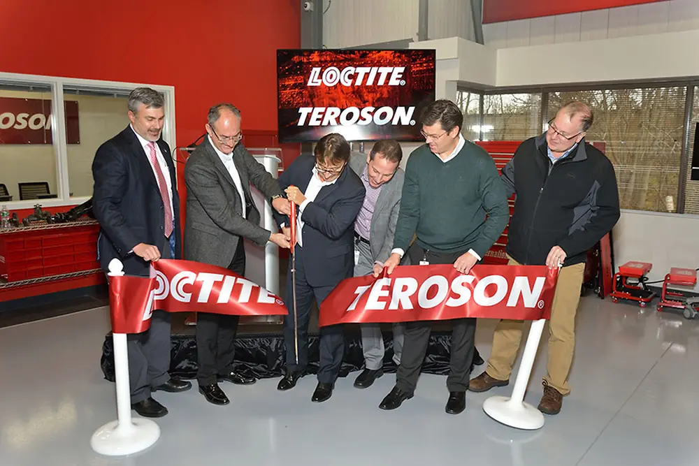 Leaders from the Henkel’s General Industry division cut the ribbon to officially open the new customer training center.