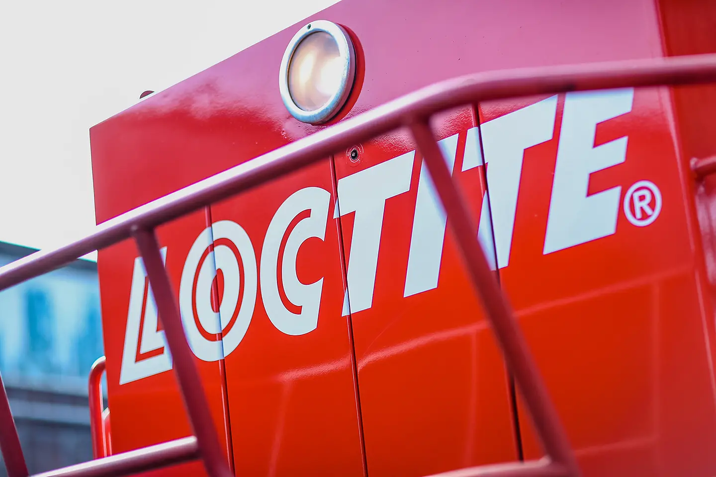 Loctite logo on the front of a locomotive
